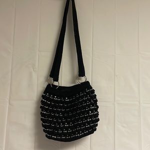 Unique purses made from soda tabs